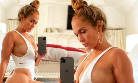 Jennifer Lopez Flashes Her Fit Frame In A White Bodysuit As She Poses For Selfcaresunday Daily Mail Online